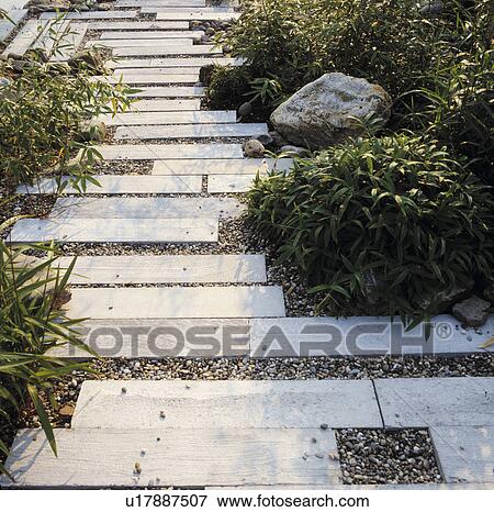 Paved path in country garden View Large Photo Image Stock Photo - Paved path in country garden. Fotosearch