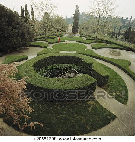 Stock Photo - Paved paths and clipped hedges in formal Italian garden&#13; &#10;. Fotosearch