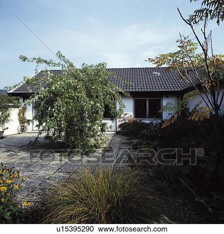 Paving in garden of small house in summer View Large Photo Image Stock Image - Paving in garden of small house in summer. Fotosearch