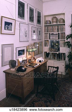 Pictures above desk in study View Large Photo Image Stock Photograph - Pictures above desk in study. Fotosearch