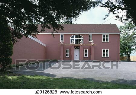 Stock Photo - Pink traditional country house with drive. Fotosearch