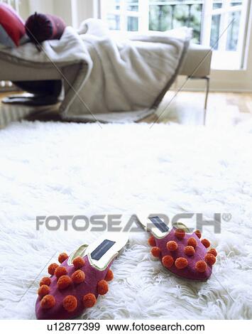 Red and purple felt slippers on flufffy white carpet View Large Photo Image Stock Photo - Red and purple felt slippers on flufffy white carpet. Fotosearch