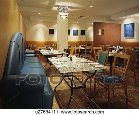 Stock Image - restaurant, interior, traditional, diningroom, hotel. Fotosearch
