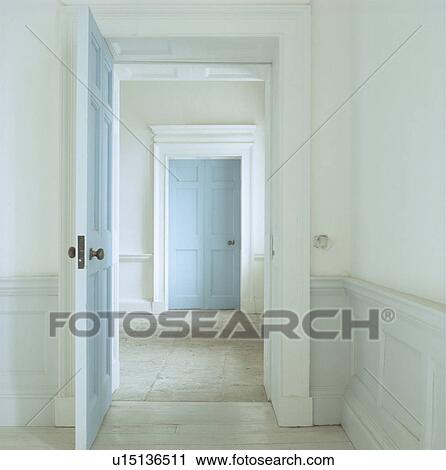 Room with pastel blue dado panelling and door open to Georgian hall with pastel blue door View Large Photo Image Stock Image - Room with pastel blue dado panelling and door open to Georgian hall with pastel blue door. Fotosearch