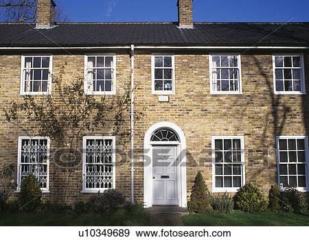 Security grills on ground floor windows of newbuild townhouse View Large Photo Image Stock Photo - Security grills on ground floor windows of newbuild townhouse. Fotosearch