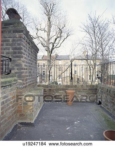 Small town roof garden before renovation View Large Photo Image Picture - Small town roof garden before renovation. Fotosearch