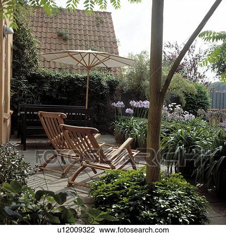 Small town roof garden in summer View Large Photo Image Stock Image - Small town roof garden in summer. Fotosearch