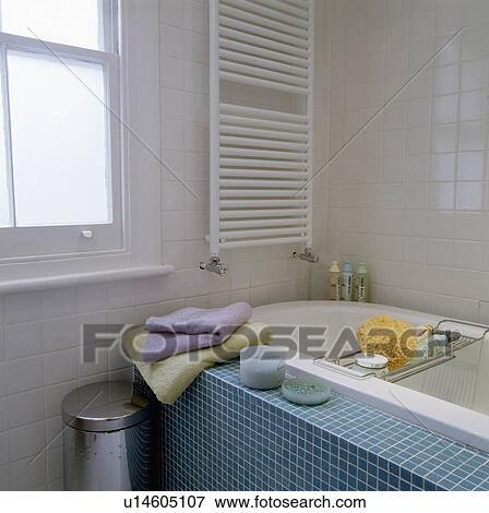 Small White Bathroom With Turquoise Tiled Bath Side Stock Photo Bathroom With Turquoise Tiled Bath