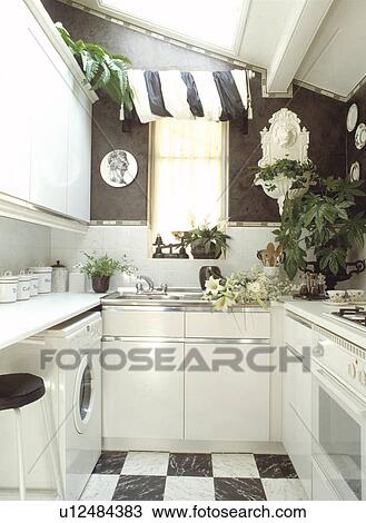 Small White Kitchen With Black White Striped Blind And Black White