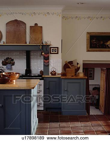 Stencilled border below cornice in blue Shaker-style traditional kitchen View Large Photo Image Stock Photo - Stencilled border below cornice in blue Shaker-style traditional kitchen. Fotosearch