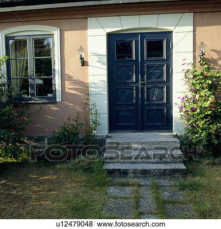 Steps to blue double door in traditional Scandinavian cottage View Large Photo Image Stock Photo - Steps to blue double door in traditional Scandinavian cottage. Fotosearch