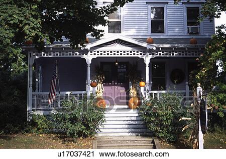 Stock Image - Steps to veranda of traditional North American house. Fotosearch
