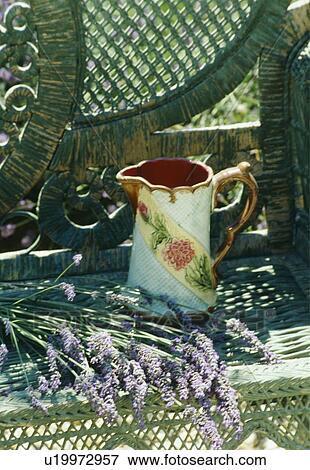 Stock Photo - Still-life of antique jug and lavender. Fotosearch