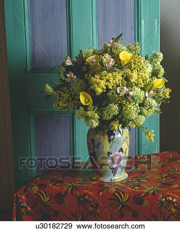 Still-Life of floral arrangement of yellow and cream flowers View Large Photo Image Stock Photo - Still-Life of floral arrangement of yellow and cream flowers. Fotosearch