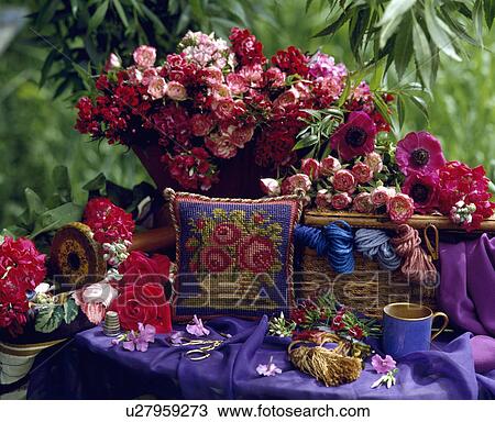 Stock Image - Still life of red roses. Fotosearch