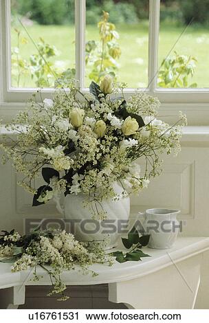 Still-Life of white flowers in jug View Large Photo Image Stock Image - Still-Life of white flowers in jug. Fotosearch