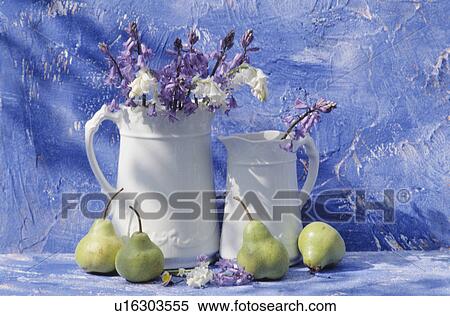 Stock Photography - Still-Life of white jugs and pears. Fotosearch