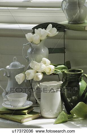 Still-Life of white tulips and jugs View Large Photo Image Stock Photograph - Still-Life of white tulips and jugs. Fotosearch