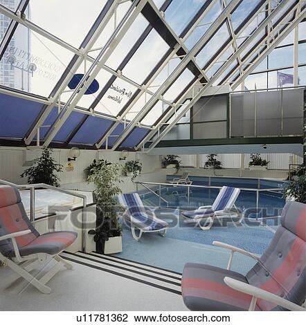 Stock Image - Swimmingpool in London hotel.. Fotosearch