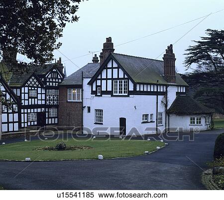 Traditional black+white house in the country View Large Photo Image Stock Photography - Traditional black+white house in the country. Fotosearch