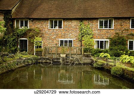 Stock Photo - Traditional brick mill house . Fotosearch