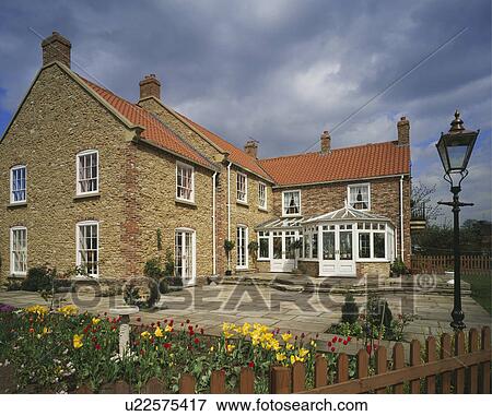 Traditional country house with extension in Spring View Large Photo Image Stock Photo - Traditional country house with extension in Spring. Fotosearch