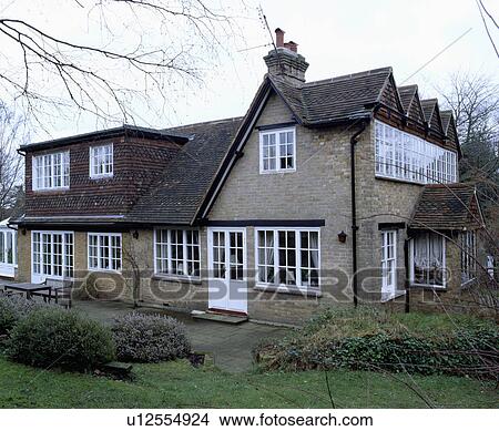 Traditional house with dormer window in the country View Large Photo Image Picture - Traditional house with dormer window in the country. Fotosearch
