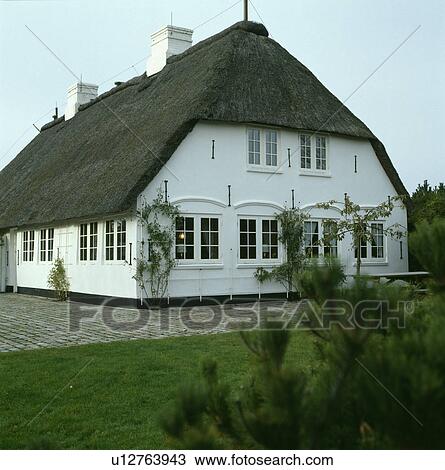 Traditional thatched country cottage View Large Photo Image Stock Image - Traditional thatched country cottage. Fotosearch