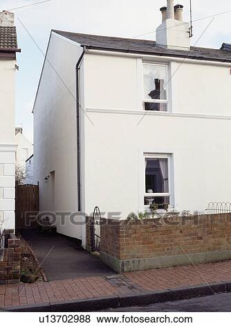 Stock Photo - Traditional white semi-detached Victorian cottage. Fotosearch
