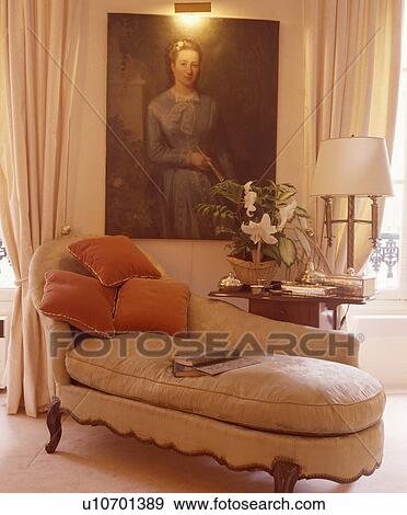 Stock Photo - Upholstered chaiselongue in traditional living room. Fotosearch