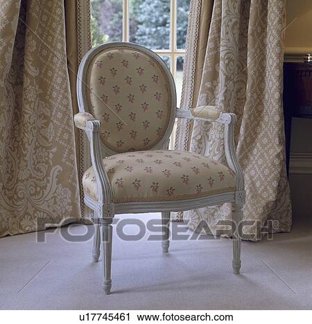 Stock Image - Upholstered French-style chair&#13; &#10; &#13; &#10; &#13; &#10; &#13; &#10; &#13; &#10;. Fotosearch