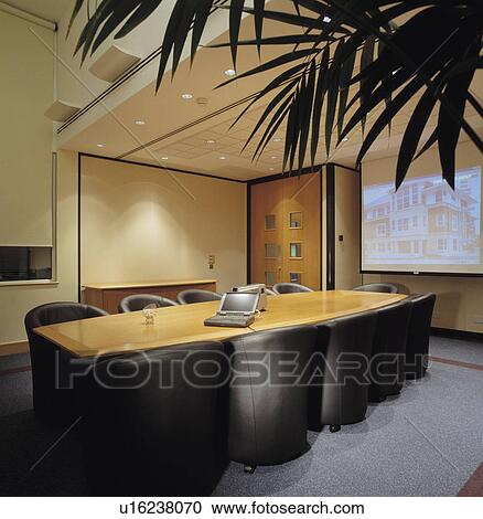 Well-lit modern designer decorated boardroom. View Large Photo Image Stock Image - Well-lit modern designer decorated boardroom.. Fotosearch
