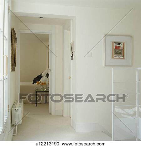 White carpet and radiator on white landing with door open to modern white bedroom View Large Photo Image Stock Image - White carpet and radiator on white landing with door open to modern white bedroom. Fotosearch