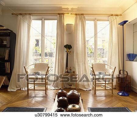 White curtains and parquet floor in white apartment living room View Large Photo Image Stock Photography - White curtains and parquet floor in white apartment living room. Fotosearch