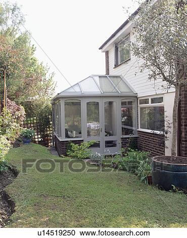 White house with conservatory extension and small lawn View Large Photo Image Stock Image - White house with conservatory extension and small lawn. Fotosearch