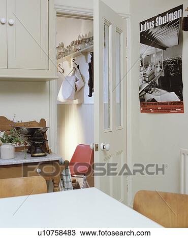 White table in small white kitchen View Large Photo Image Stock Image - White table in small white kitchen . Fotosearch