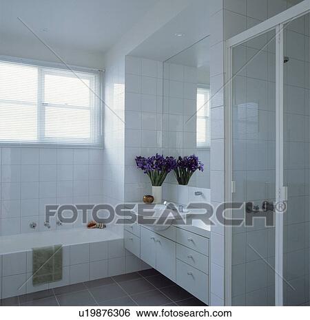 White tiled architectural bathroom. View Large Photo Image Stock Photograph - White tiled architectural bathroom.. Fotosearch