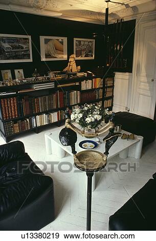 Stock Photo - White wooden flooriboards in black+white living room. Fotosearch
