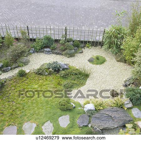 Aerial view of Japanese-style garden with stone paving and gravel path View Large Photo Image Stock Photo - Aerial view of Japanese-style garden with stone paving and gravel path. Fotosearch
