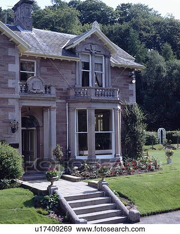 Stock Photo - Bay window on traditional Victorian house in the country. Fotosearch