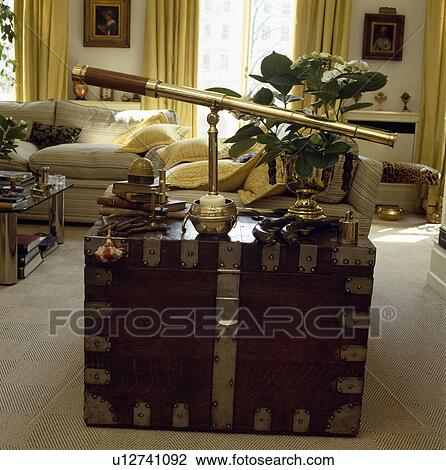 Brass telescope on brass-bound wooden chest View Large Photo Image Stock Image - Brass telescope on brass-bound wooden chest. Fotosearch
