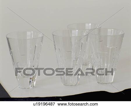 Stock Photo - Close-up of 4 water glasses. Fotosearch