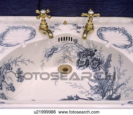 Close-up of blue+white French antique porcelain basin with brass taps View Large Photo Image Stock Photograph - Close-up of blue+white French antique porcelain basin with brass taps. Fotosearch
