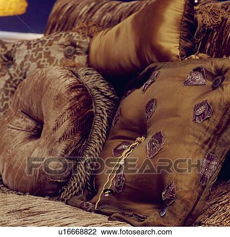 Close-up of bronze silk and velvet cushions View Large Photo Image Stock Image - Close-up of bronze silk and velvet cushions. Fotosearch