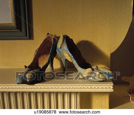 Stock Photo - Close-up of ceramic stiletto-heeled shoes. Fotosearch
