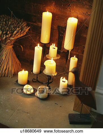 Close-up of lighted candles View Large Photo Image Stock Photo - Close-up of lighted candles. Fotosearch