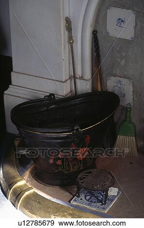 Stock Photo - Close-up of painted coal-scuttle. Fotosearch