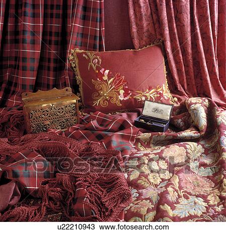 Close-up of red fabric and cushion View Large Photo Image Stock Image - Close-up of red fabric and cushion. Fotosearch