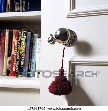 Close-up of red tassel on door handle View Large Photo Image Stock Photography - Close-up of red tassel on door handle. Fotosearch