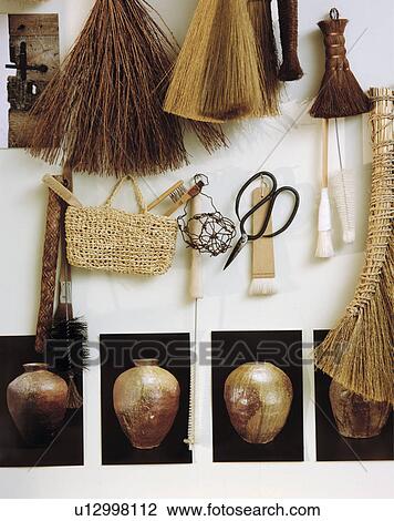 Close-up of rustic brushes and scissors on wall View Large Photo Image Stock Image - Close-up of rustic brushes and scissors on wall . Fotosearch